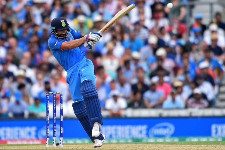 India made three changes to their squad. Spinner Yuzvendra Chahal, all-rounder Kedar Jadhav and pacer Bhuvneshwar Kumar have been replaced with pacer Shardul Thakur, who makes his debut, and chinaman Kuldeep Yadav and batsman Manish Pandey, who were brought in. Virat Kohli,Virat Kohli reaches his 45th half-century,Virat Kohli 50,Virat Kohli 45th half-century,virat kohli captain,India vs Sri Lanka,India vs Sri Lanka 2017