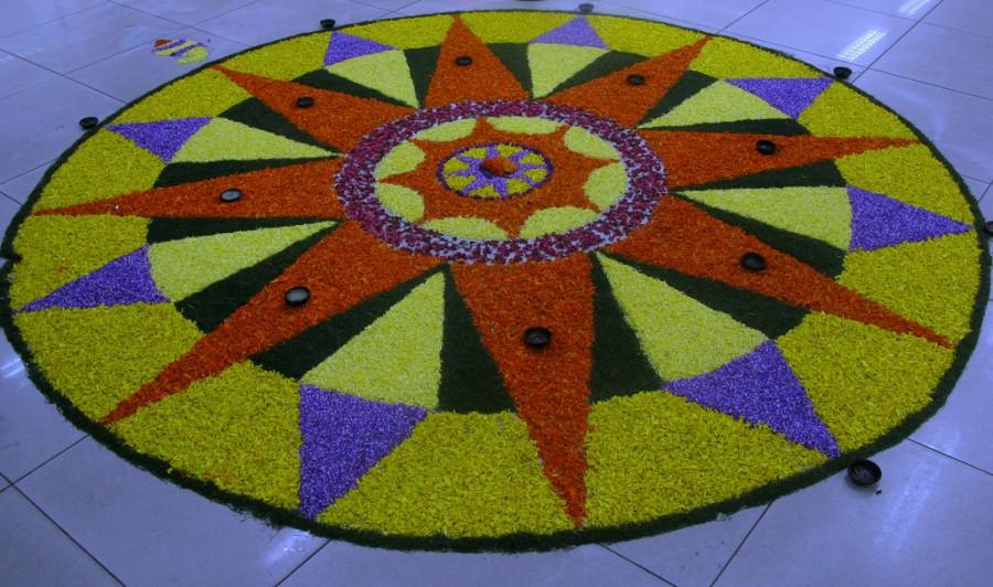 International Business Times India wishes all the readers a very happy and prosperous Onam. Onam 2017,Onam pookalam designs,easy pookalam designs,easy pookalam patterns,onam flower carpet,onam flower carpet designs,onam flower carpet patterns,Onapookalam,flowers used for pookalam