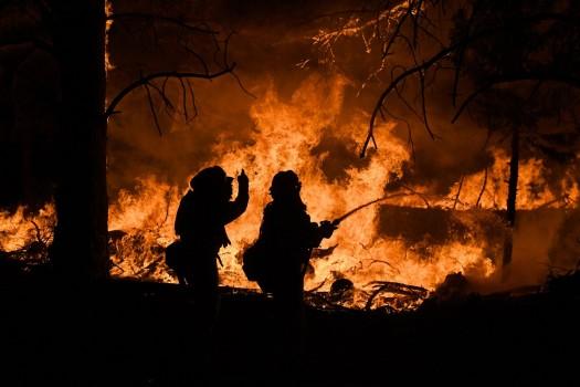 Firefighters battle the Ponderosa Fire east of Oroville.