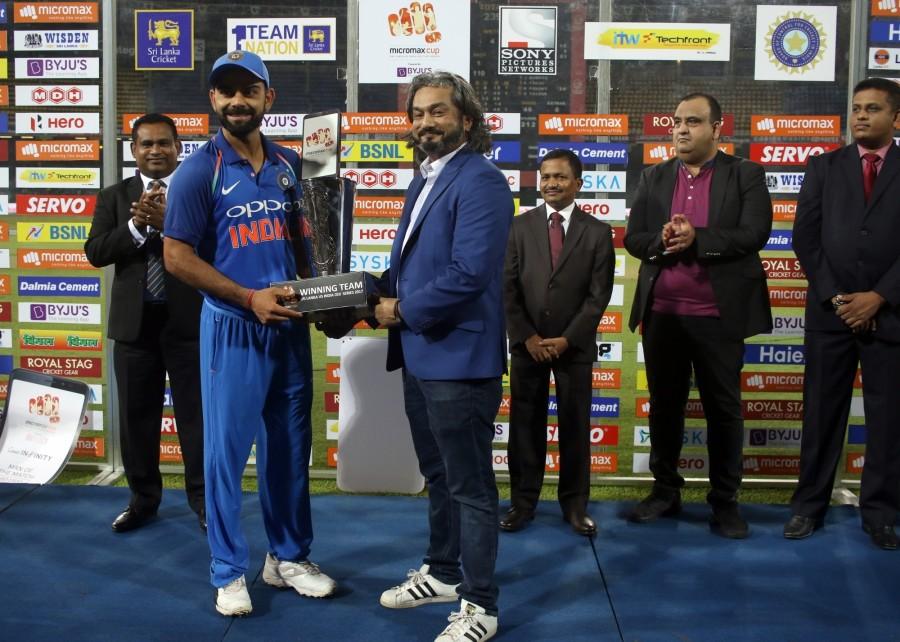Virat Kohli led the way with a century as India defeated Sri Lanka by six wickets in the fifth and final One-Day International (ODI) at the R.Premadasa Stadium here on Sunday evening. Chasing a target of 239 runs, India crossed the line with 21 balls to spare. Kohli remained unbeaten on 110 runs off 116 balls, smashing nine boundaries along the way. He was involved in a 108-run partnership with Kedar Jadhav, who scored 63 runs off 73 balls before being caught behind off Wanidu Hasaranga's bowling a couple of balls before the end. This was the 30th century of Kohli's ODI career. India vs Sri Lanka,India vs Sri Lanka 2017,India vs Sri Lanka 5th ODI,Virat Kohli,Bhuvneshwar Kumar,Virat Kohli and Bhuvneshwar Kumar