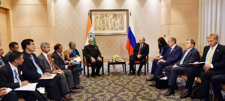 Prime Minister Narendra Modi meets the President of Russian Federation Vladimir Putin, on the sidelines of the 9th BRICS Summit, in Xiamen, China on September 04, 2017. BRICS Summit 2017,BRICS Summit,brics summit 2017 in china,BRICS Summit 2017 meetings,Vladimir Putin,Narendra Modi,Modi meets Putin