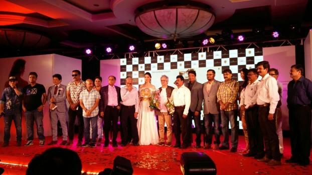 The full cast and crew of Julie 2 pose for the paps at the trailer launch.