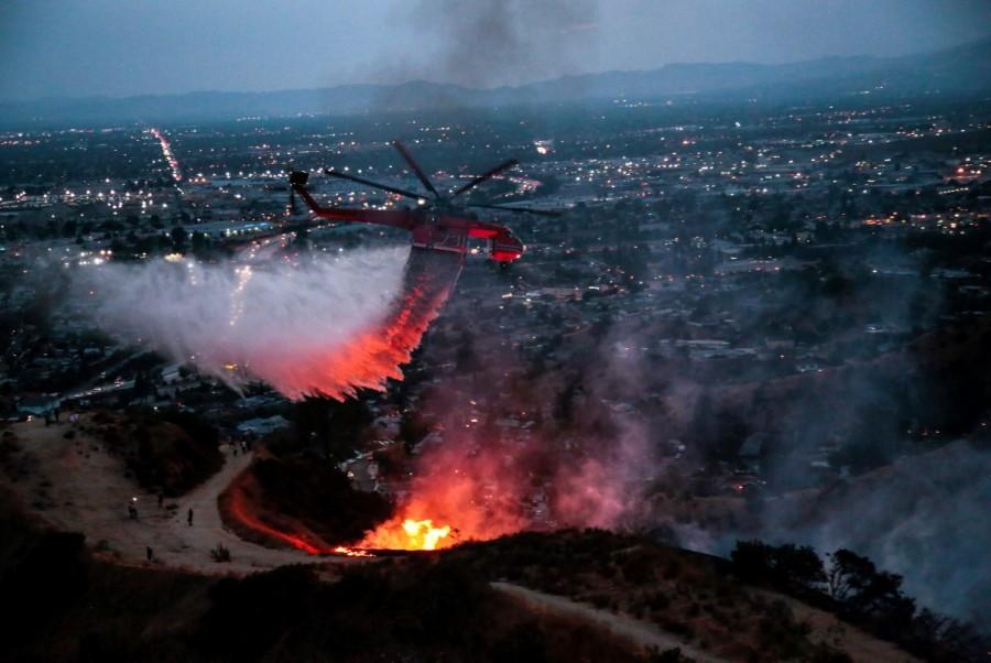 Water is dropped above homes in Sun Valley during the La Tuna Canyon fire over Burbank. Los Angeles wildfires,Los Angeles wildfire,Largest wildfire in Los Angeles history,Largest wildfire in Los Angeles,California wildfires,La Tuna Fire,Burbank and Glendale