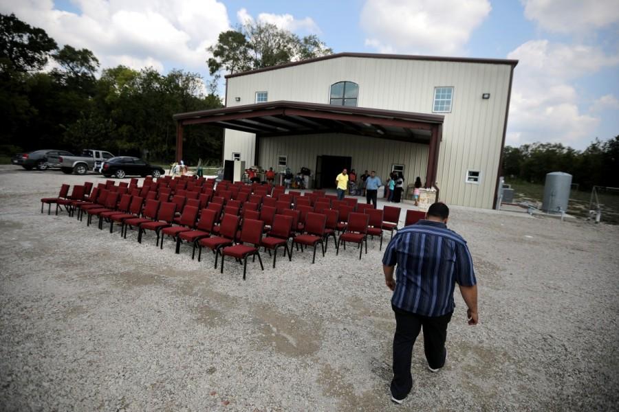 Chairs are seen drying outside of a pentecostal church where local residents prepare for Sunday service after tropical storm Harvey in east Houston, Texas, U.S., September 2, 2017. Evacuees return home,Harvey evacuees return hom,evacuees return hom,Harvey evacuees,Harvey in Houston,Tropical Storm Harvey in Houston