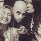 Singer-songwriter Zayn Malik, known for making some drastic hair moves, has gone bald. On September 3, Zayn's mother Trish Malik shared an Instagram photo of herself, her son and his girlfriend Gigi Hadid. The black-and-white image shows the "Pillowtalk" hitmaker with a bald head and stubble, reports eonline.com.