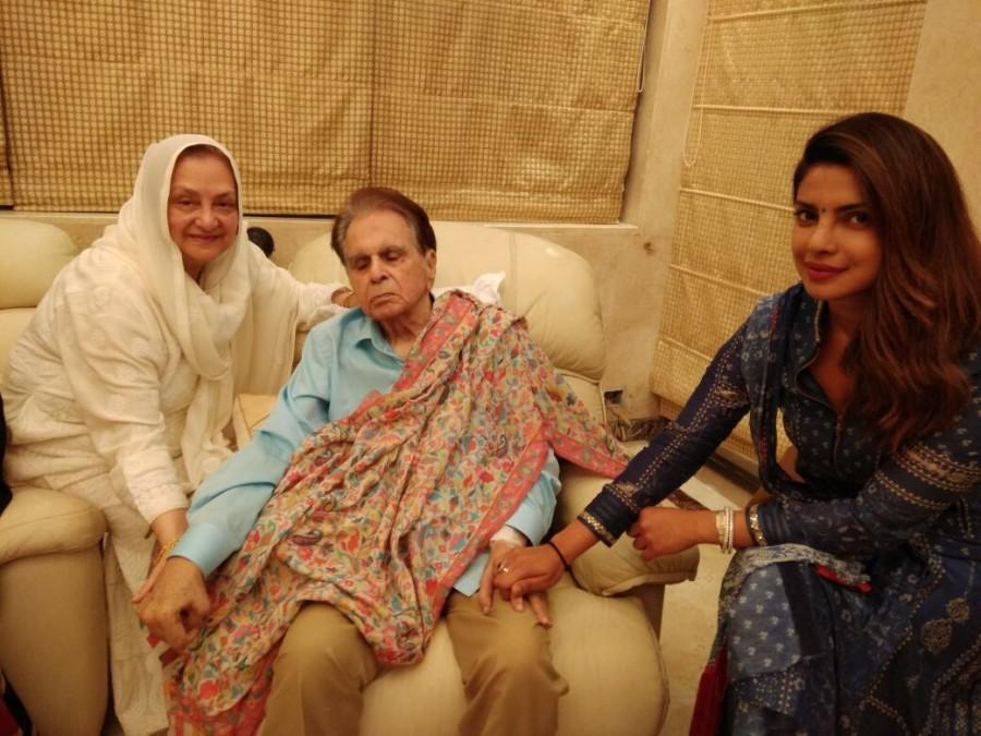 Actress Priyanka Chopra, who keeps juggling between her life in India and the US, took some time out from her busy schedule to spend with ailing veteran actor Dilip Kumar and his wife Saira Banu. She says it was "lovely". "It was lovely seeing both of you. Thank you and so good to see Saab much better. Much love," Priyanka tweeted on Monday night. A post from Dilip Kumar's official handle features two photographs from Priyanka's visit. She is seen dressed in a simple indigo Indian wear and a matching bindi. In one image, she is seen holding Dilip Kumar's hand, and in another she is seen kissing his forehead. Priyanka Chopra,Priyanka Chopra visits Dilip Kumar,Dilip Kumar,Saira Banu,Priyanka Chopra and Dilip Kumar,Dilip Kumar and Saira Banu