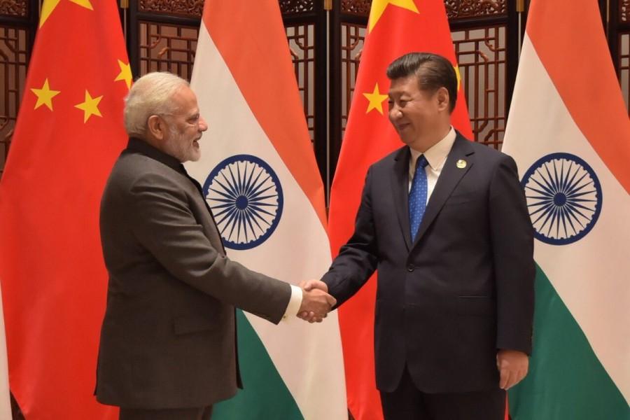 Indian PM Narendra Modi and Chinese President Xi Jinping on Tuesday discussed their border row, a week after the resolution of the two-month-long military stand-off at Doklam. BRICS Summit 2017,BRICS Summit,Narendra Modi and Xi Jinping,Narendra Modi,Xi Jinping,india vs china,India and China,border peace,Doklam