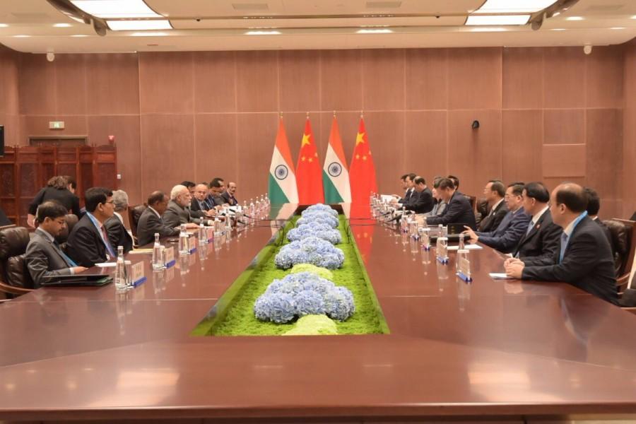 Indian Prime Minister Narendra Modi and Chinese President Xi Jinping on Tuesday discussed their border row, a week after the resolution of the two-month-long military stand-off at Doklam. BRICS Summit 2017,BRICS Summit,Narendra Modi and Xi Jinping,Narendra Modi,Xi Jinping,india vs china,India and China,border peace,Doklam
