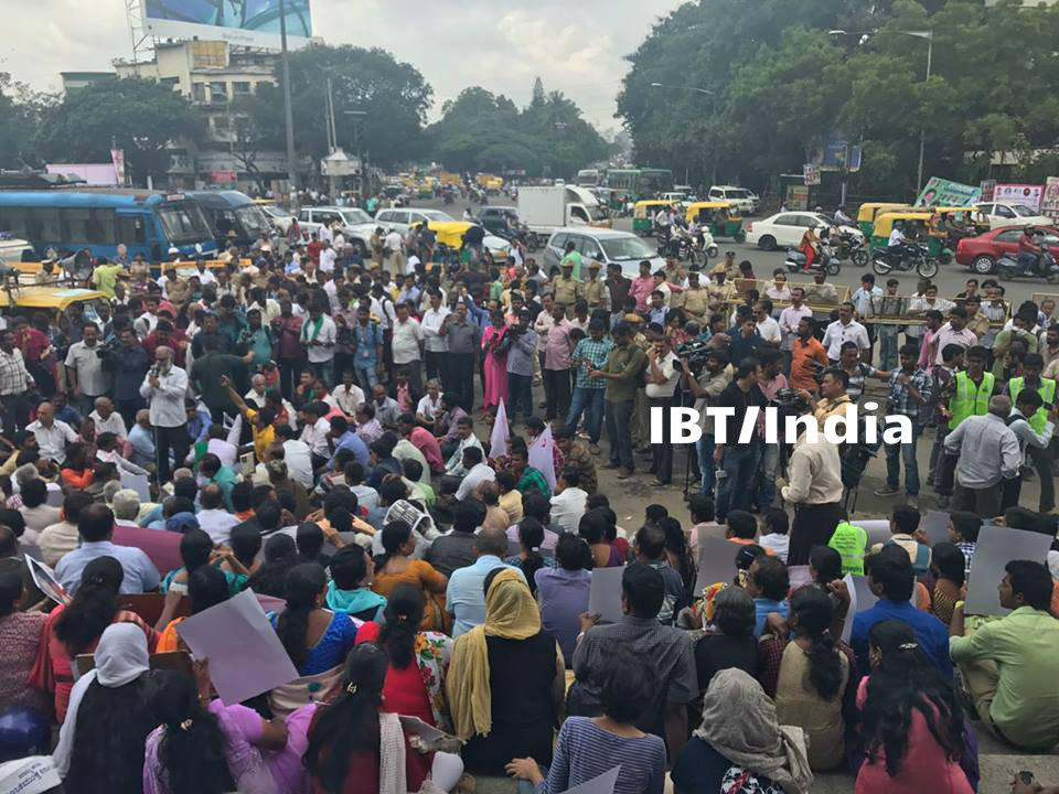 Protests erupted across Karnataka on Wednesday morning condemning the dastardly killing of senior Kannada journalist Gauri Lankesh, who was shot dead at her residence here on Tuesday night by three unidentified men. Journalist Gauri Lankesh death,Gauri Lankesh death,Gauri Lankesh,gauri lankesh killed,Protest at town hall,Gauri Lankesh Protest