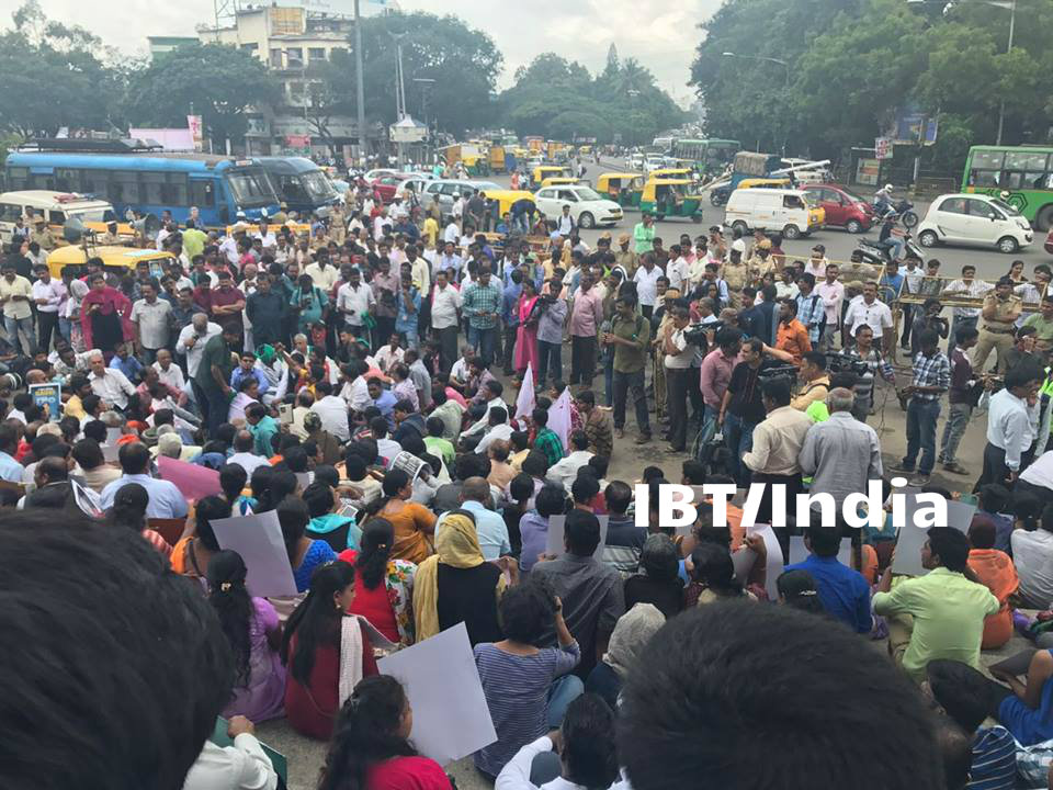 Protests erupted across Karnataka on Wednesday morning condemning the dastardly killing of senior Kannada journalist Gauri Lankesh, who was shot dead at her residence here on Tuesday night by three unidentified men. Journalist Gauri Lankesh death,Gauri Lankesh death,Gauri Lankesh,gauri lankesh killed,Protest at town hall,Gauri Lankesh Protest