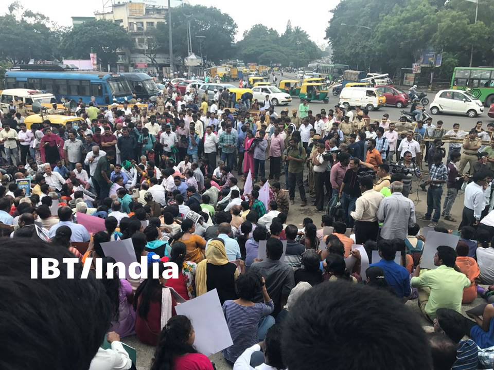 Protests erupted across Karnataka on Wednesday morning condemning the dastardly killing of senior Kannada journalist Gauri Lankesh, who was shot dead at her residence here on Tuesday night by three unidentified men. Journalist Gauri Lankesh death,Gauri Lankesh death,Gauri Lankesh,gauri lankesh killed,Protest at town hall,Gauri Lankesh Protest