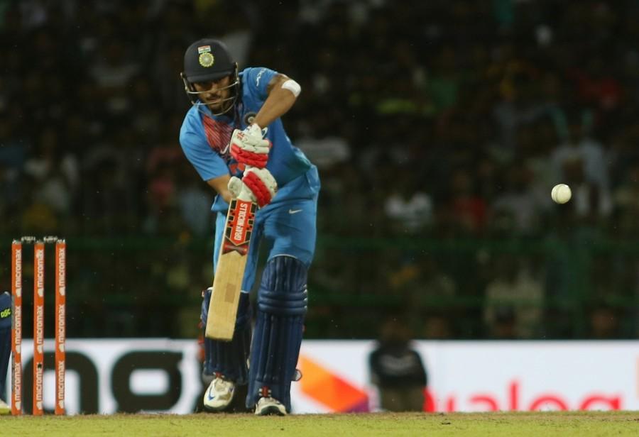 Pandey hit the winning runs in style, hitting Thisara Perera for a boundary to the mid-off fence which also brought up his half-century. Earlier, Sri Lanka rode on Dilshan Munaweera's 29-ball brisk half century to post 170/7. Put in to bat after a rain-delayed start, the hosts lost the opening duo of skipper Upul Tharanga (5) and Niroshan Dickwella (17) within the first five overs to totter at 46/2. India's T20 specialists -- Bhuvneshwar Kumar and Jasprit Bumrah -- gave the visitors a perfect start to remove the opening duo. Bhuvneshwar got rid of Tharanga with a perfect in-swinger as the ball crashed into his middle stumps before Bumrah, who was bludgeoned for three boundaries in his first over, came back to castle Dickwella in the fifth over of the innings. Coming in at No.3, Munaweera (53 from 29 balls, 5*4, 4*6) saved the hosts from the blushes with a fighting half century that came off 26 balls before all-rounder Ashan Priyanjan's unbeaten run-a-ball 40 helped them to a healthy total. India vs Sri Lanka T20,India vs Sri Lanka T20 pics,India vs Sri Lanka T20 images,Virat Kohli,Manish Pandey,India beat Sri Lanka by 7 wickets,India beat Sri Lanka