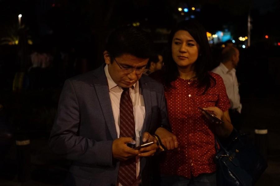 People react on a street after an earthquake jolted Mexico City, capital of Mexico, on Sept. 8, 2017. An earthquake measuring 8.2 on the Richter scale hit off the coast of Chiapas State of Mexico at 12:49 p.m. Beijing time on Friday, according to preliminary reports from the China Earthquake Networks Center. Earthquake,Earthquake in Mexico,Mexico,Mexico earthquake,Guatemala,US Geological Survey,Tsunami
