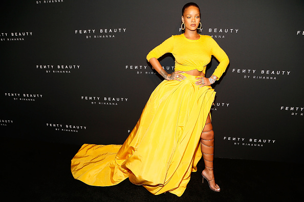 Rihanna arrives to the Fenty by Rihanna Launch at the Duggal Greenhouse. Rihanna,singer Rihanna,Braless Rihanna,Rihann strappy sandals,Rihann at Fenty NYFW beauty launch,Fenty NYFW beauty launch,NYFW beauty launch