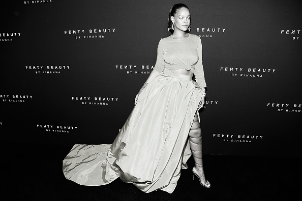 Rihanna arrives to the Fenty by Rihanna Launch at the Duggal Greenhouse on September 7, 2017 in New York City. Rihanna,singer Rihanna,Braless Rihanna,Rihann strappy sandals,Rihann at Fenty NYFW beauty launch,Fenty NYFW beauty launch,NYFW beauty launch