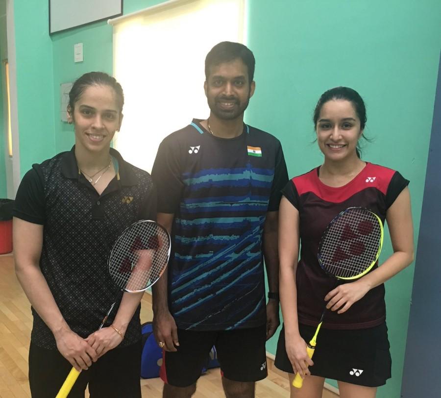 "Today training with the champ herself Saina Nehwal," Shraddha posted on Instagram, where she shared two photographs on Friday. On Twitter, she wrote: "Talk about a special practice session. With the champ and her grand master." In one image, she has posed with Saina, and in another photograph, she is seen learning some tricks from the badminton ace in a court. Shraddha looks at ease in a pair of shorts and t-shirt as well as bright sneakers to suit the sporty environment. Saina Nehwal,Gopichand,Shradhha Kapoor,Shradhha Kapoor on Saina Nehwal biopic,Pullela Gopichand,Shraddha Kapoor
