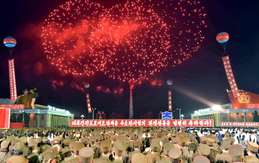 Pyongyang city civilians celebrate the successful completion of the hydrostatic test for the intercontinental ballistic rocket installation in this undated photo released by North Korea's Korean Central News Agency (KCNA) in Pyongyang Pyongyang city civilians celebrate the successful completion of the hydrostatic test for the intercontinental ballistic rocket installation in this undated photo released by North Korea's Korean Central News Agency (KCNA) in Pyongyang. North Korea,North Korea celebrates nuclear test,nuclear test,hydrostatic test,intercontinental ballistic rocket