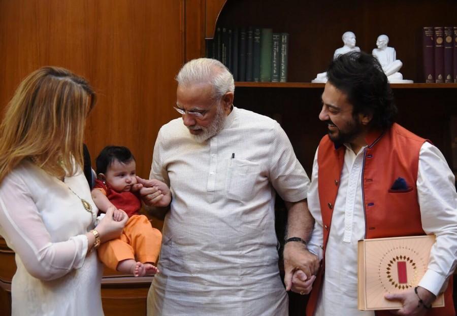 Prime Minister Narendra Modi welcomed singer Adnan Sami and Roya's daughter Medina, who was born in May this year. Adnan and his wife met Modi on Friday and also shared sweets with him which they had brought from the city of Medina, read a statement. They were with Modi for 40 minutes where he also bonded and played with Medina. "Sharing the sweets of our first born daughter Medina with the Prime Minister whom I respect and look upto was an emotional moment for me and my wife... we will cherish this moment all our life," said Adnan. Roya Sami Khan with whom Adnan got hitched in 2010 happens to be his third wife. Earlier, he married Pakistani actor Zeba Bakhtiar in 1993 and Arab Sabah Galadari in 2001. Narendra Modi,PM Narendra Modi,Prime Minister Narendra Modi,singer Adnan Sami,Adnan Sami,Medina