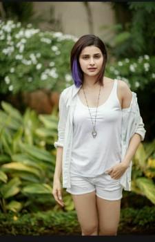 Prachi Desai is known to break rules, be it on the professional front or personal. This Bollywood actress makes her own rules and sticks by it with all her heart. Her fashion sense is quite different from the rest of the Bollywood actresses too, and this time around she's gone an extra mile for the rockstar that she plays in her next by colouring her hair purple.