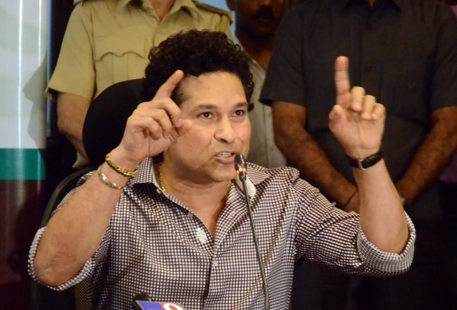 Former cricketer Sachin Tendulkar addresses at the launch of Mission 24 - a project supported by NGO Apnalaya and Municipal Corporation of Greater Mumbai (MCGM) in Mumbai. Sachin Tendulkar,Sachin,Sachin Tendulkar launches Mission 24,Sachin launches Mission 24,Mission 24,Former Indian cricketer Sachin Tendulkar