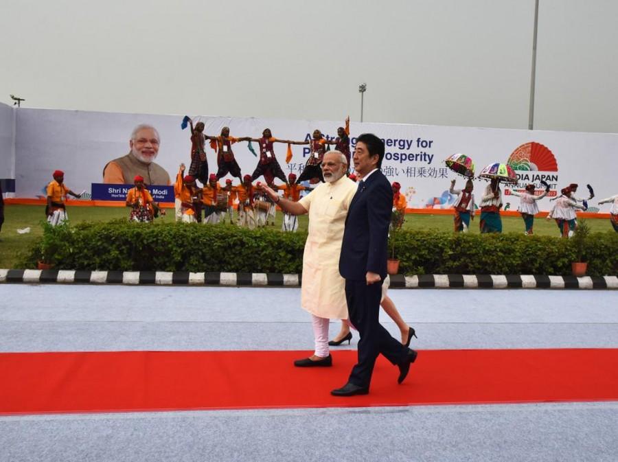 Japanese Prime Minister Shinzo Abe arrived here on Wednesday on a two-day visit to India during which he will hold talks with Prime Minister Narendra Modi and both will lay the foundation stone of the ambitious Rs 1.08 lakh crore ($17 billion) Ahmedabad-Mumbai bullet train project. In a special gesture, Modi personally received Abe with a warm hug at the Sardar Vallabhbhai Patel International Airport here. Narendra Modi,PM Narendra Modi,Shinzo Abe,Shinzo Abe in India,Japanese Prime Minister Shinzo Abe,Shinzo Abe at Ahmedabad airport