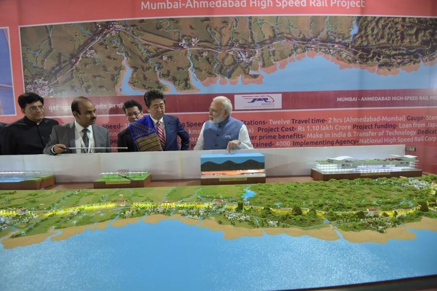 According to Railway Ministry officials, the operating speed of the bullet train would be 320 kmph and the maximum speed would be 350 kmph. Later in the day, Modi and Abe will participate in the 12th Annual Bilateral Summit in state capital Gandhinagar. This will be the fourth annual summit between Modi and Abe, where they are expected to review the progress in the multifaceted cooperation between India and Japan under the framework of their Special Strategic and Global Partnership. Narendra Modi,Shinzo Abe,Narendra Modi and Shinzo Abe,Shinzo Abe in India,Japanese Prime Minister Shinzo Abe,high-speed rail project