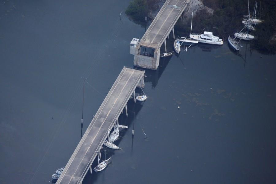 A bridge with boats washed up under in Marathon. Hurricane Irma,Florida Keys,Florida Keys by Hurricane Irma