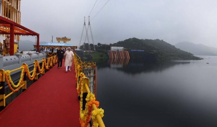He said governments formulate and implement schemes, some of them face problems too, but "Maa Narmada is the only one which encountered the maximum hurdles. At one time, the entire world had ganged up against the scheme, the World Bank decided and stopped the loan to the ambitious project on the pretext of environment but the people of Gujarat stood firm. "They were committed to complete the dam even if the Word Bank stopped giving money. Even temples of this state organised donations for this dam," Modi said, adding that the water of Narmada was not simple water but "it is paaras" (a touchstone that converts iron to gold). PM Narendra Modi,Narendra Modi,Modi inaugurates Narmada dam,Narmada dam,Narendra Modi inaugurates Narmada dam,Sardar Sarovar Dam project