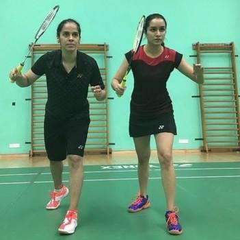 Actress Shraddha Kapoor, who is essaying Saina Nehwal in a Bollywood biopic, was delighted to be coached by India's star shuttler herself and her mentor Pullela Gopichand.