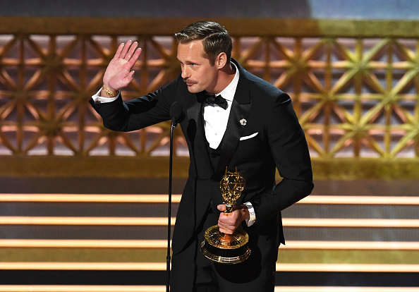 Actor Alexander Skarsgard accepts Outstanding Supporting Actor in a Limited Series or Movie for 'Big Little Lies' onstage during the 69th Annual Primetime Emmy Awards at Microsoft Theater on September 17, 2017 in Los Angeles, California. Nicole Kidman and Alexander Skarsgard,Nicole Kidman,Alexander Skarsgard,Nicole Kidman and Alexander Skarsgard kiss,Nicole Kidman kisses Alexander Skarsgard,Emmy Awards 2017,Emmy Awards