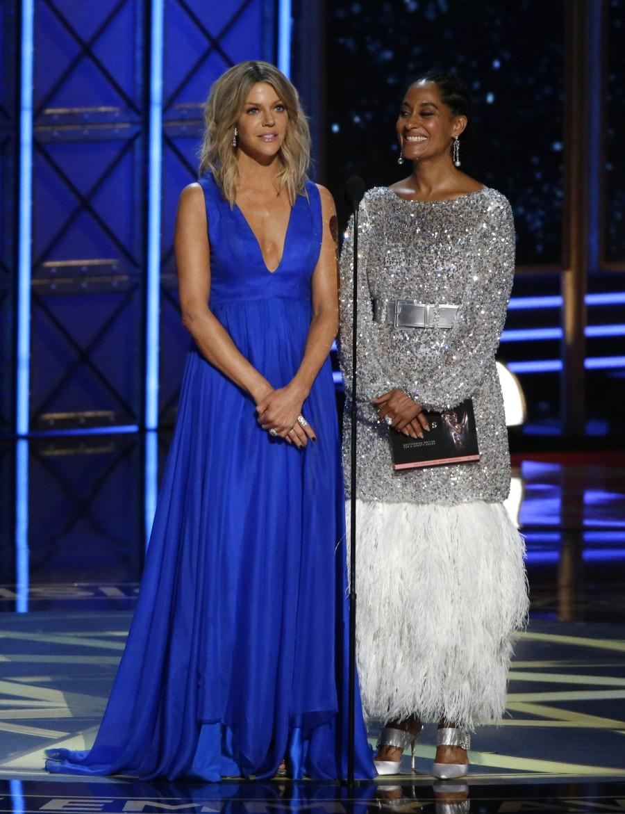 Kaitlin Olsen (L) and Tracee Ellis Ross present the award Outstanding Writing for a Variety Series. Emmy Awards,Emmy Awards 2017,69th Primetime Emmy Awards,10 Best Moments from Emmys 2017,Best Moments from Emmys 2017,Best Moments from Emmys