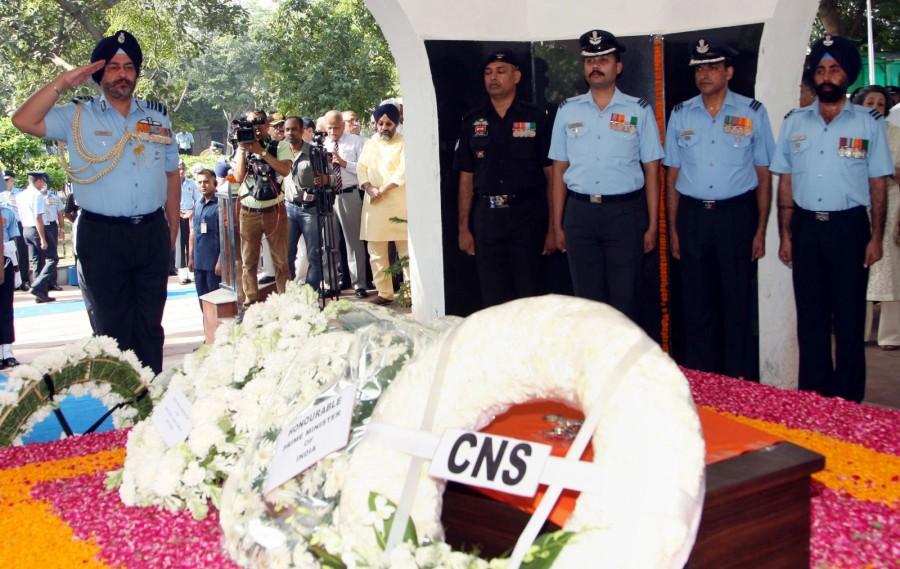 The IAF's Sukhoi-30 fighters in the "missing man" formation along with the Mi-17V5 choppers in "insignia" formation made the flypast paying their last respects to the national hero. Arvind Singh, son of Arjan Singh lit the pyre after Sikh priests performed religious rituals. India bids to Arjan Singh,Air Force Marshal Arjan Singh state funeral,IAF Arjan Singh funeral,Indian Air Force Arjan Singh,Arjan Singh funeral