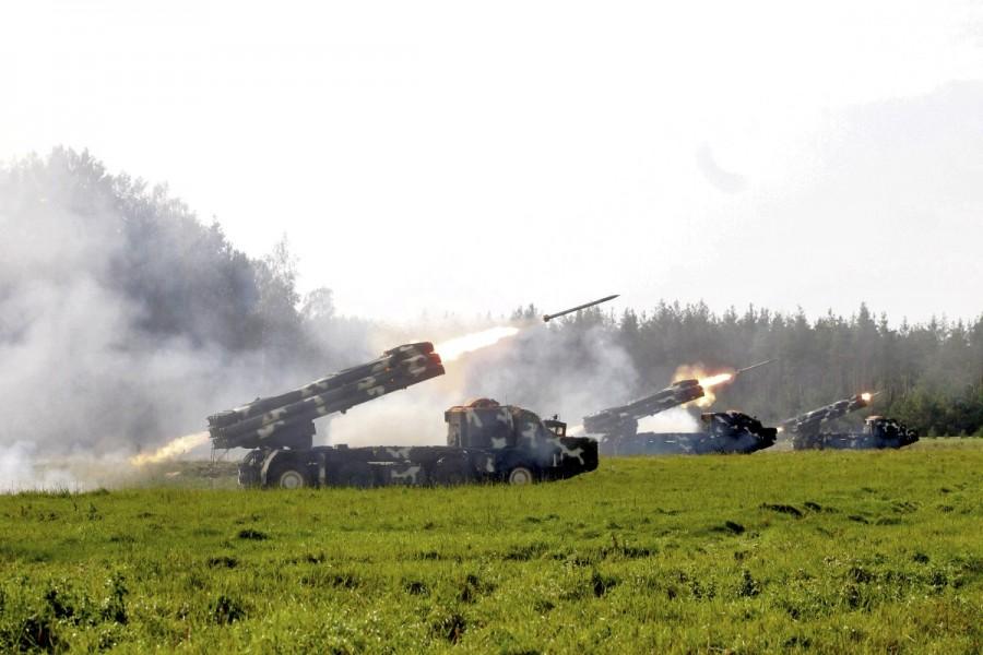 Multiple rocket launcher systems fire during the Zapad-2017 war games, held by Russian and Belarussian servicemen. Russian war games,Russian war,Russia’s biggest war games,Russian war games rattle West,Mi-8 helicopter,Vladimir Putin