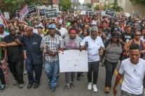 Anthony Lamar Smith's mother, Annie, walks with family and protesters during a peaceful rally after the not guilty verdict in the murder trial of Jason Stockley, a former St. Louis police officer charged with the 2011 shooting of Smith, in St. Louis, Missouri, U.S. September 17, 2017.