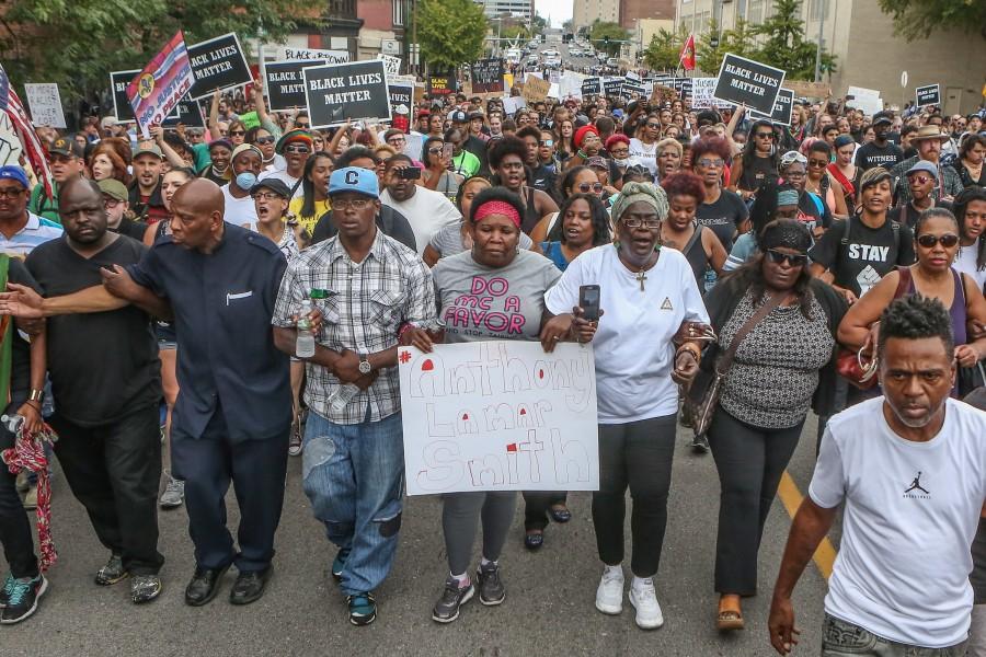 Anthony Lamar Smith's mother, Annie, walks with family and protesters during a peaceful rally after the not guilty verdict in the murder trial of Jason Stockley, a former St. Louis police officer charged with the 2011 shooting of Smith, in St. Louis, Missouri, U.S. September 17, 2017. St. Louis Justice Center,St. Louis Justice,Protests in St. Louis,Protests at St. Louis,Jason Stockley,St. Louis police officer Jason Stockley,Anthony Lamar Smith