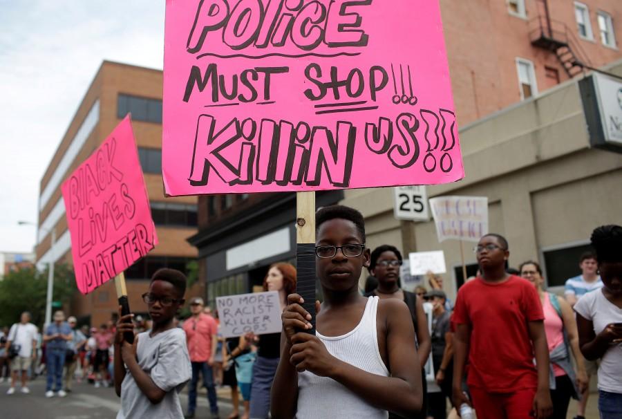 People continue to march after the not guilty verdict in the murder trial of Jason Stockley, a former St. Louis police officer, charged with the 2011 shooting of Anthony Lamar Smith, who was black, in St. Louis, Missouri, U.S. St. Louis Justice Center,St. Louis Justice,Protests in St. Louis,Protests at St. Louis,Jason Stockley,St. Louis police officer Jason Stockley,Anthony Lamar Smith