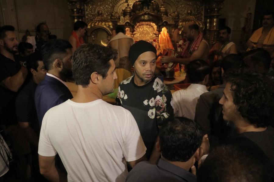 Brazilian and former Barcelona football superstar Ronaldinho visits Siddhivinayak temple in Mumbai. Ronaldinho,Ronaldinho visits Siddhivinayak temple,Ronaldinho at Siddhivinayak temple