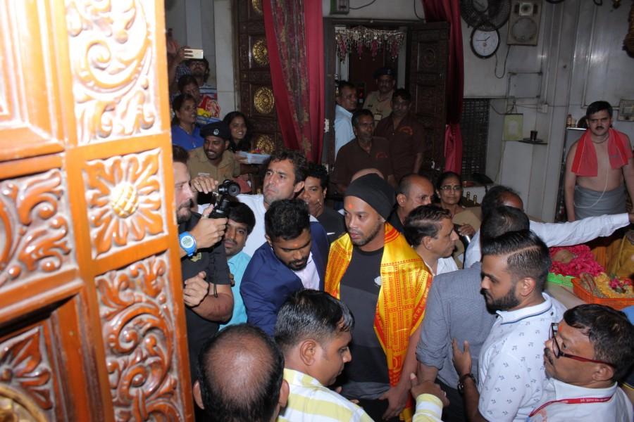 Brazilian and former Barcelona football superstar Ronaldinho visits Siddhivinayak temple in Mumbai on 15 September 2017. Ronaldinho,Ronaldinho visits Siddhivinayak temple,Ronaldinho at Siddhivinayak temple