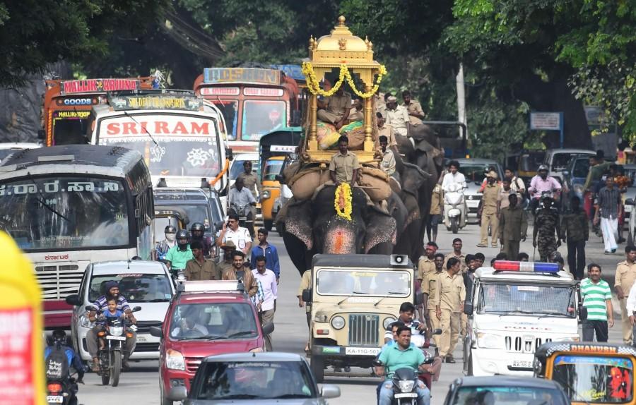 Mysuru, located about 150km from Karnataka capital Bengaluru, attracts visitors from across the world during Dasara, which has been celebrated over centuries to mark the triumph of good over evil. The fest includes a multitude of cultural celebrations and the iconic Mysuru Palace built in 1912 is lit up with thousands of light bulbs during the evening. This spectacle draws at least 10 lakh visitors from the states of Tamil Nadu, Andhra Pradesh, Telangana, Kerala, Maharashtra among others. Mysore,Mysore Dasara,mysore dasara in photos,Mysore Dasara festival,Dasara festival,Mysore Dasara festival pics,Mysore Dasara festival images,Mysore Dasara festival stills,Mysore Dasara festival pictures,Mysore Dasara festival photos