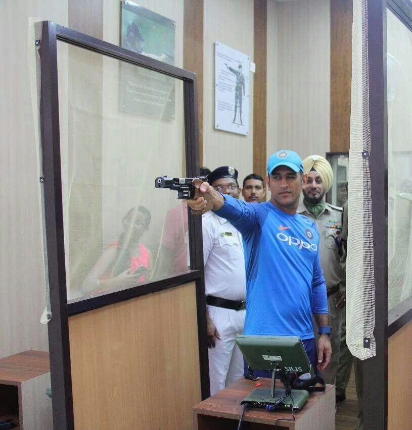 Straight after playing foot volleyball with his teammates here at the Eden Gardens on Wednesday, former India captain Mahendra Singh Dhoni headed to Kolkata Police Training School for a pistol shooting session. "The great MS Dhoni takes some time off to practice his shooting skills at our state of the art shooting range this afternoon at Police Training School. His accuracy is breathtaking," Kolkata Police posted on their Facebook page. MS Dhoni,Dhoni,Mahendra Singh Dhoni,Dhoni pays visit to Kolkata Police Training School,Kolkata Police Training School,Dhoni at Kolkata Police Training School,Dhoni at shooting session