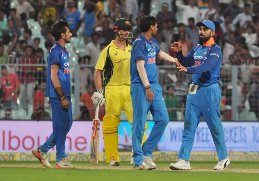 At 106/4, Smith was running out of partners and eventually departed after notching up his 17th fifty in his 100th ODI. Pandya took his wicket with substitute Ravindra Jadeja taking the catch running in from deep square leg. The show then belonged to Kuldeep who first drew Wade to chop the ball onto his stumps followed by Agar who was trapped in front. The Kanpur lad then celebrated like never before in the next delivery with Dhoni taking the catch of Cummins behind the wicket. Pandya and Bhuvneshwar shaved off the tail then, taking the wickets of Kane Richardson (0) and Nathan Coulter-Nile (8) to script India's eighth win on the bounce. Earlier, skipper Kohli played a fabulous knock but fell eight short of a well deserved century as India put up a challenging score of 252 after calling the toss correctly. Chinaman Kuldeep Yadav,Chinaman Kuldeep Yadav gets hat-trick,Chinaman Kuldeep Yadav hat-trick,Kuldeep gets hat-trick,India beat Australia in second ODI,India beat Australia