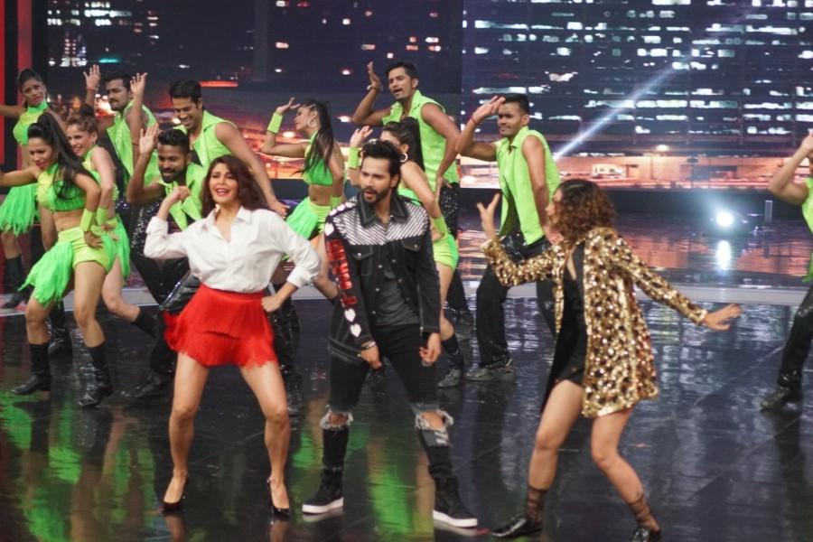 Actors Taapsee Pannu, Varun Dhawan and Jacqueline Fernandez perform during the promotion of their upcoming film "Judwaa 2" on the sets of "Dance Plus 3" in Mumbai on Sept 21, 2017. Taapsee Pannu,Jacqueline Fernandez,Varun Dhawan,Judwaa 2,Judwaa 2 promotion,Judwaa 2 movie promotion,Judwaa 2 on Dance Plus 3,Dance Plus 3
