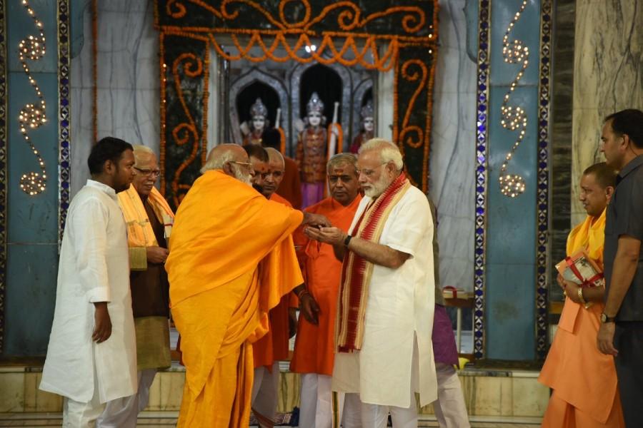 The temple draws thousands of devotees every year. Behind a stone named 'Manas', there are five books kept with Ram-Ram written on it by people. The Prime Minister, a staunch devotee of Goddess Durga and who is on a nine-day Navratri fast, also offered prayers at the ancient Durga Kund temple. Narendra Modi,PM Narendra Modi,Prime Minister Narendra Modi,Narendra Modi offers prayers at Tulsi Manas,Modi at Durga Kund