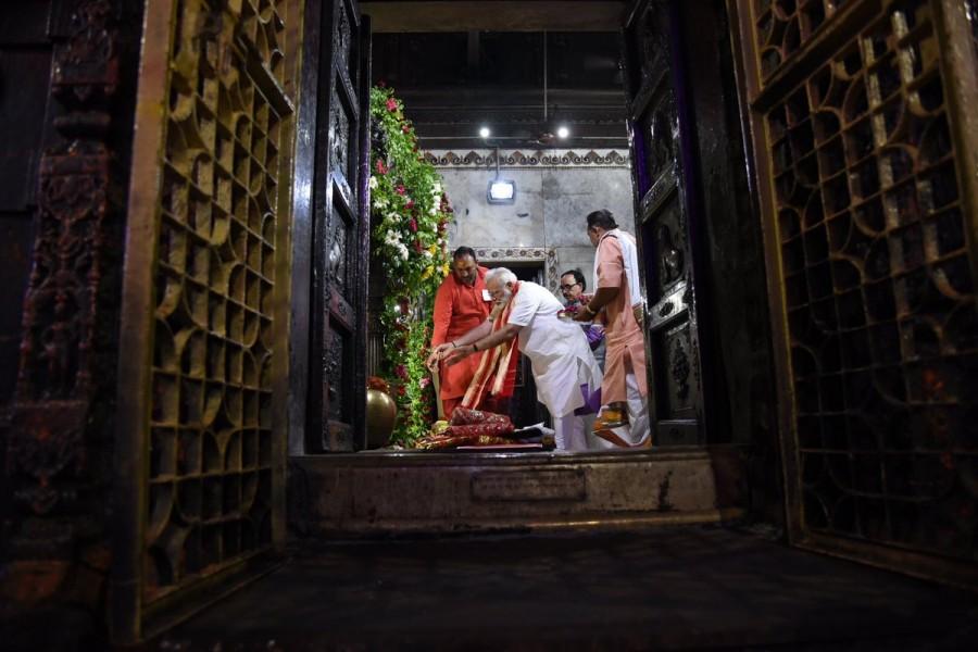 Earlier in the day, soon after arriving in the temple town, also his parliamentary constituency, Modi inaugurated 17 projects and laid foundation stones of six others. Narendra Modi,PM Narendra Modi,Prime Minister Narendra Modi,Narendra Modi offers prayers at Tulsi Manas,Modi at Durga Kund