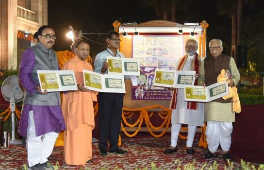 Prime Minister Narendra Modi releases a postal stamp on 
