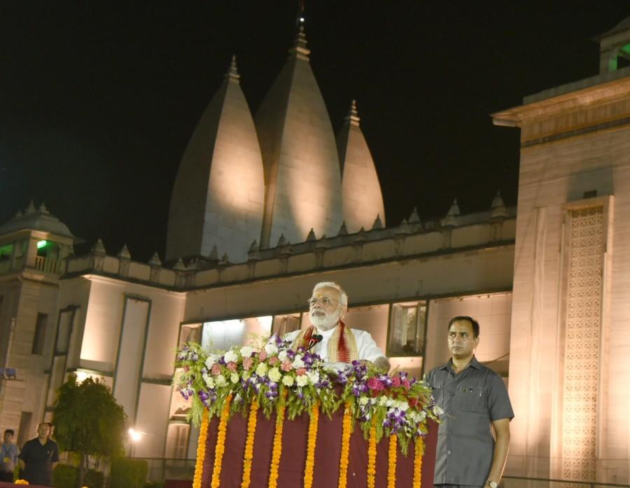 Prime Minister Narendra Modi addresses after releasing a postal stamp on "Ramayana" during his visit to Tulsi Manas Temple in Varanasi on Sept 22, 2017. Prime Minister Narendra Modi,Narendra Modi,Ramayana,postal stamp on Ramayana,Ramayana postal stamp,Modi in Varanasi