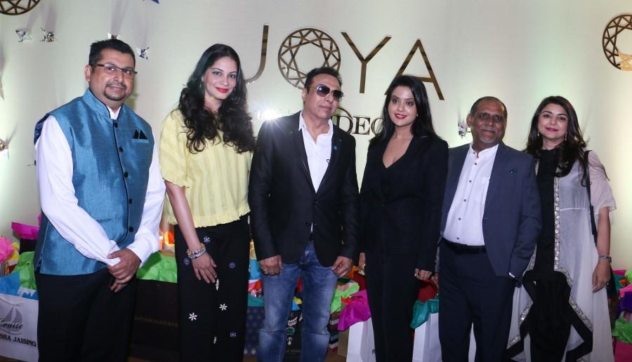 Jacqueline Fernandes, Amruta Fadnavis, Yes Bank's Radha Kapoor lit the lamp and launched JOYA - a fashion and lifestyle exhibition in Mumbai. Jacqueline Fernandes,Amruta Fadnavis,Yes Bank's Radha Kapoor,JOYA - a fashion and lifestyle exhibition