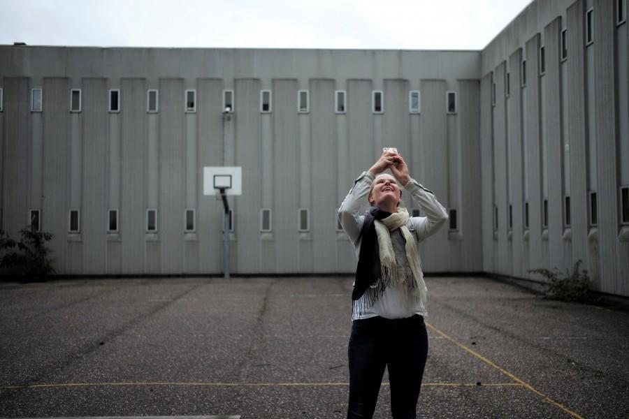 A visitor takes photos inside the former The Bijlmerbajes prison turned Movement Hotel. The staff know their residence status is uncertain, but all hope to gain experience and build up their resumes as they dream of future employment in a more normal life. "We heard from the (Dutch) government that if the situation in Syria is safe, we must go back," said the hotel manager, Hachem, who like other staff asked that his surname not be used because of the potential danger to his family in Syria. Once he has been in the Netherlands five years, however, he hopes to get permission to remain long-term. Former Dutch prison,Dutch prison,Netherlands,prison now offers refuge as hotel