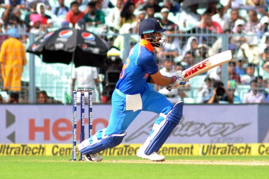 India skipper Virat Kohli equalled his previous incumbent Mahendra Singh Dhoni's run of nine consecutive wins after the series clinching five-wicket win over Australia in the third One-Day International (ODI) here on Sunday. India rode on a superb batting performance to register an unassailable 3-0 lead in the ongoing five-match series against the reigning world champions. After Rohit Sharma and Ajinkya Rahane gave the hosts a steady start, in-form all-rounder Hardik Pandya regaled the packed stands at the Holkar Stadium with some power-packed batting lower down the order. Virat Kohli,MS Dhoni,Virat Kohli equals MS Dhoni,Mahendra Singh Dhoni,India skipper Virat Kohli,India vs Australia