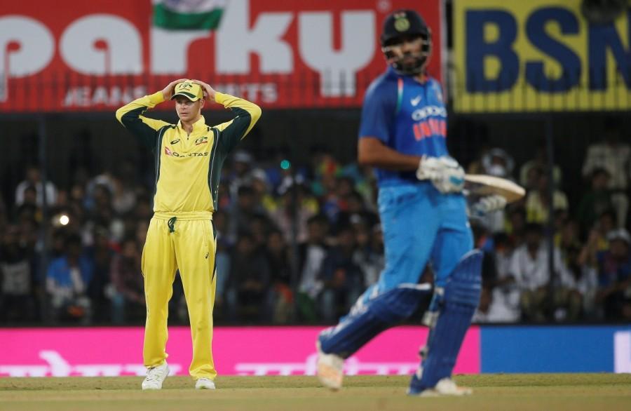 The Australian bowlers tasted their first success Rahane fell to a slower, cross-seam delivery from Richardson. The Mumbai batsman was outfoxed by the lack of pace even as he stepped out of his crease to attempt another big hit, only to find Finch at the long-on boundary. Sharma was run out a short while later after being involved in a horrendous bit of mix up with Kohli. The Indian skipper was bowled a couple of overs later Nathan Coulter-Nile as the visitors gained the upper hand. Jadhav and Hardik Pandya tried to stage a fightback, adding 78 runs between them off 77 deliveries. Leg-spinner Adam Zampa broke the partnership when Pandya, who scored 41 runs off 40 deliveries, was caught at long-off by Warner while trying to hit the ball out of the park. Jadhav, who top scored for the hosts with 67 runs, kept Indian hopes alive with 61-run stand with Manish Pandey which came off 51 balls. Jadhav, whose spirited 69-ball knock included seven hits to the fence and a six, was dismissed when he misread a slow leg-cutter by Richardson with Finch latching on to the ball at long-off. Australia beat India,Australia vs India,Australia beat India by 21 runs,Virat Kohli
